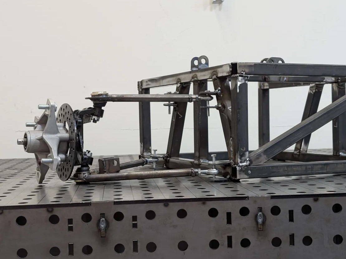 Front suspension prototype without wheel and shock, for real-world motion and stress analysis
